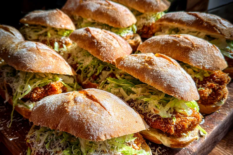 Fresh ingredients for Crispy Chicken Caesar Sandwich