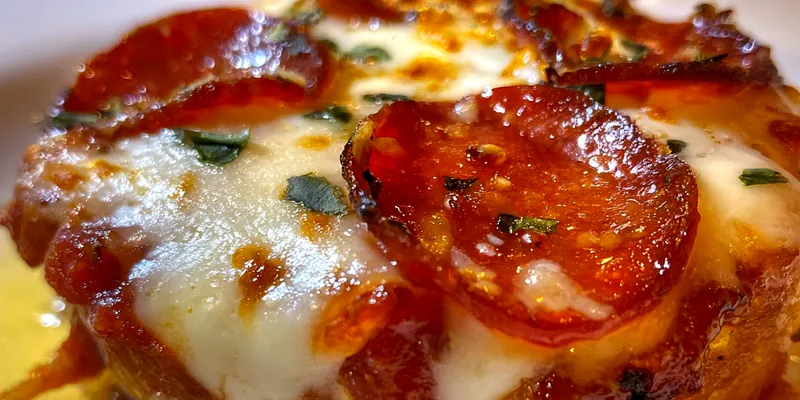 Delicious Mini Deep Dish Pizzas served on a plate