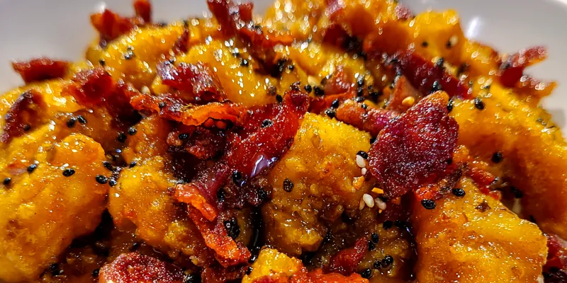 Delicious Sweet Bacon Glazed Chicken served on a plate